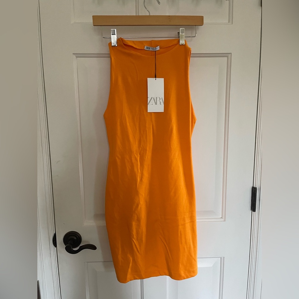 Orange bodycon mini dress from Zara. Cotton. Double lined.